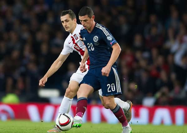 Graham Dorrans in action for Scotland.