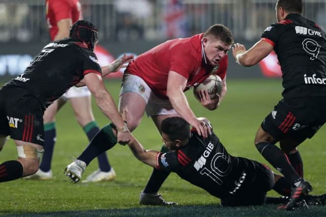 British and Irish Lions prop forward Tadhg Furlong runs at the Canterbury Crusaders defence during their match in Christchurch. Picture; Getty