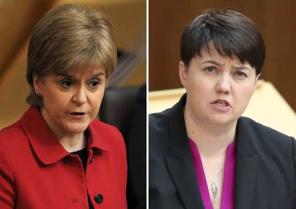 First Minister Nicola Sturgeon (left) and Scottish Conservative party leader Ruth Davidson. The SNP has accused opposition parties of wanting a recession. Picture: PA