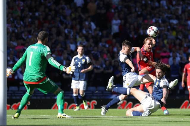 Harry Kane fires over Craig Gordon's bar. Picture: Martin Rickett/PA Wire