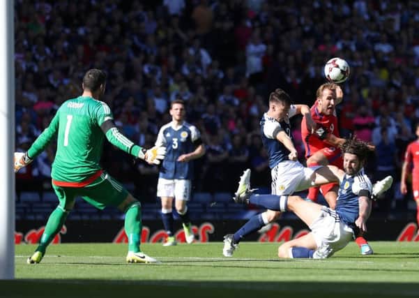 Harry Kane fires over Craig Gordon's bar. Picture: Martin Rickett/PA Wire