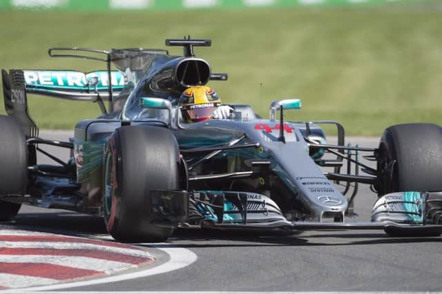 Lewis Hamilton set the fastest lap ever recorded at the Circuit Gilles Villeneuve to make sure he was first on the grid in Montreal. Photograph: Graham Hughes/AP