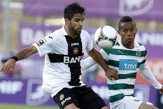 Daniel Candeias (left) in action for Nacional in the Portuguese top-flight. Picture: GREGORIO CUNHA/AFP/Getty Images