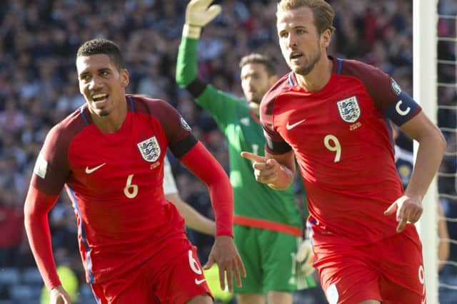 England's Harry Kane celebrates his late volley that rescued a point at Hampden. Picture: Craig Williamson/SNS