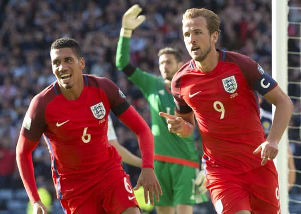 England's Harry Kane celebrates his late volley that rescued a point at Hampden. Picture: Craig Williamson/SNS