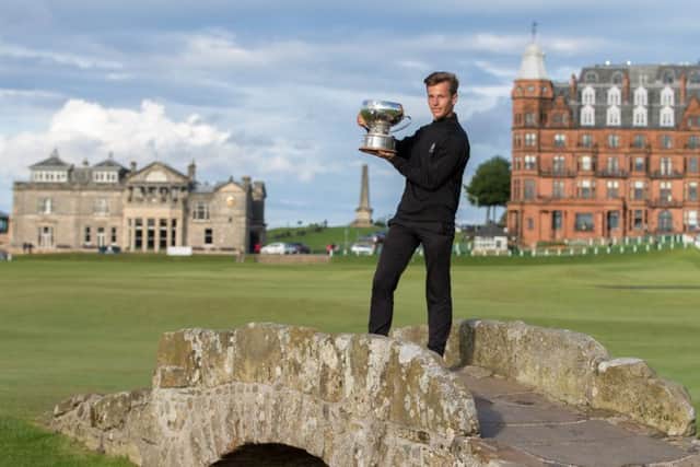 Matthew Jordan holds aloft the Links Trophy after his one-shot success in the prestigious 72-hole event at St Andrews. Picture: Kenny Smith