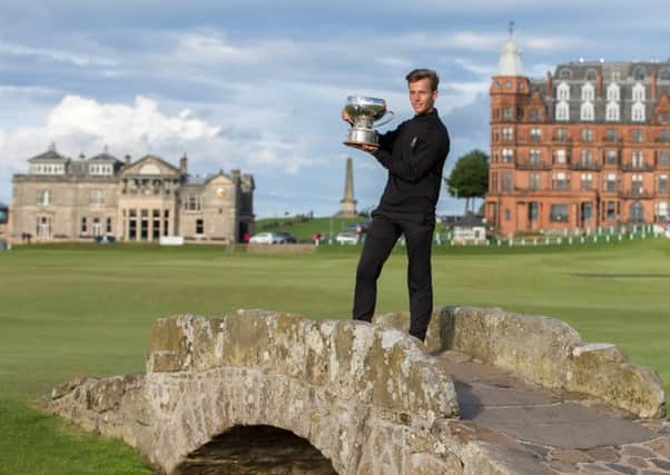 Matthew Jordan holds aloft the Links Trophy after his one-shot success in the prestigious 72-hole event at St Andrews. Picture: Kenny Smith
