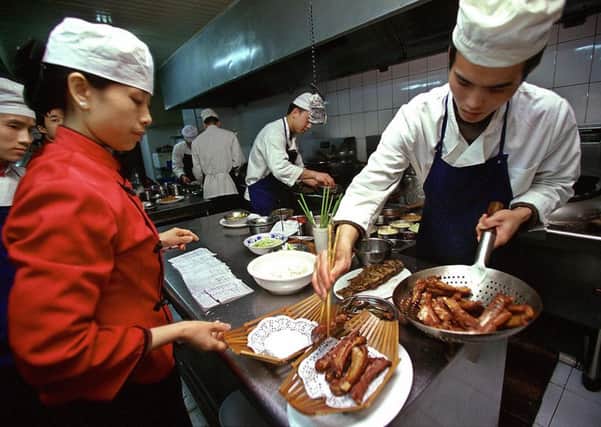 Slowing consumer spending is hitting the services sector. Picture: Liu Jin/AFP/Getty Images