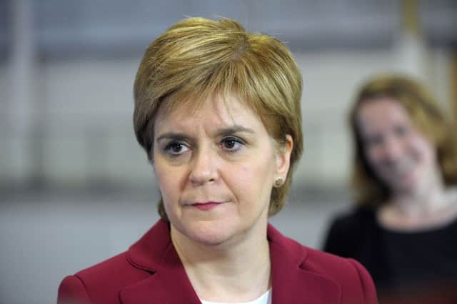 First Minister Nicola Sturgeon has said she will take time to reflect for the SNP post-election.  Picture: ANDY BUCHANAN/AFP/Getty Images)