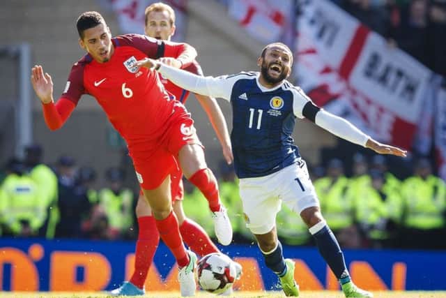 Ikechi Anya, right, believes Scotland have plenty to build on for their remaining matches. Picture: SNS.