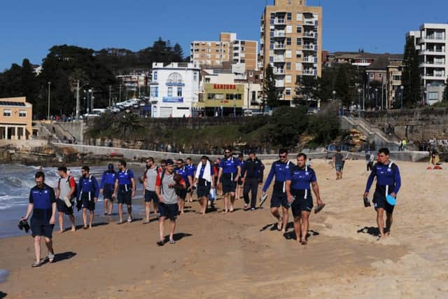 Scotland players make their way along Coogee beach to start a recovery session.
Scotland rugby union squad recovery session, Coogee Beach, Coogee, Sydney, Australia, Monday 12th June 2017 
***Please credit: Fotosport/David Gibson***