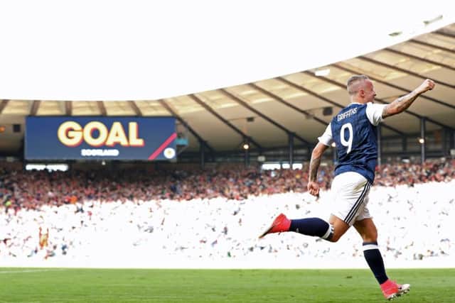 Leigh Griffiths celebrates scoring  Scotland's second in the 2-2 draw against England.
