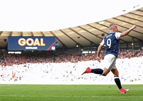 Leigh Griffiths celebrates scoring Scotland's second in the 2-2 draw against England.
