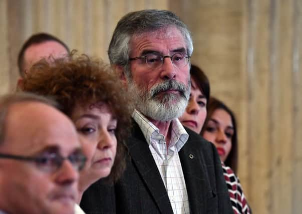 Sinn Fein president Gerry Adams holds a press conference alongside party members at Stormont. Picture: Charles McQuillan/Getty Images