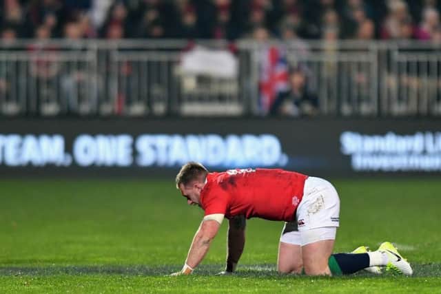 Stuart Hogg goes down injured in Lions win over Crusaders. Picture: Kai Schwoerer/Getty Images