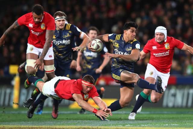 Malakai Fekitoa of the Highlanders splits the Lions . Picture: Hannah Peters/Getty Images