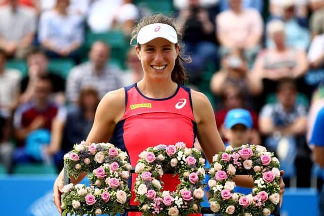 Johanna Konta is presented with a wreath to commemorate her 300th singles career win after her victory over Tara Moore at the Aegon Open Nottingham. Picture: Jordan Mansfield/Getty Images for LTA