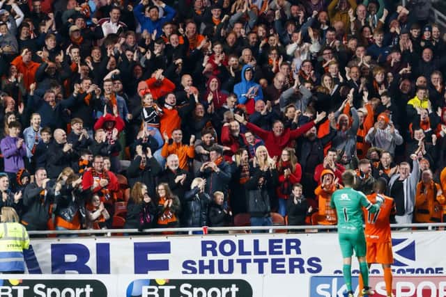 12/05/17 LADBROKES PREMIERSHIP PLAY-OFFS QUATER FINAL
DUNDEE UTD V MORTON
TANNADICE - DUNDEE
Dundee UTD’s wato Kuate (17) celebrates his goal with the fans and team mate Cammy Bell