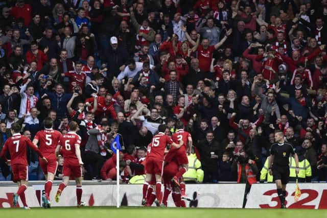 Aberdeen fans filled the away end at Ibrox. Picture: SNS/Rob Casey