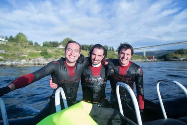 Calum (left) with his brothers Robbie and Jack who have undertaken several wild swimming challenges together. PIC: Contributed.
