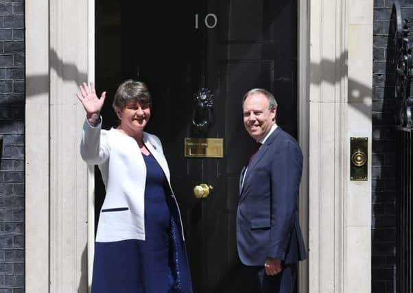 DUP leader Arlene Foster and MP Nigel Dodds arrive at 10 Downing Street. Picture: Jack Taylor/Getty Images)