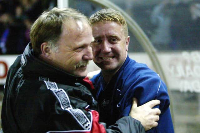 John Robertson celebrates with No2 Donald Park after his Inverness side defeated Celtic in the Scottish Cup quarter-finals in 2003. Picture: PA