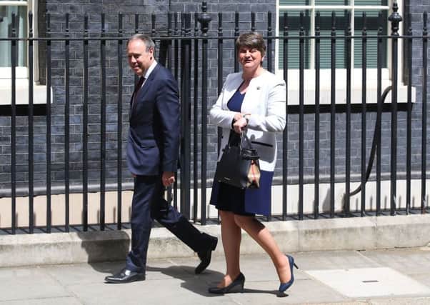 DUP leader Arlene Foster and MP Nigel Dodds arrive at 10 Downing Street for talks. Picture: Getty