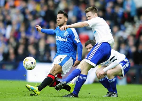 Harry Forrester, left, could have played his last game for Rangers. Picture: Michael Gillen