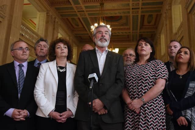 Sinn Fein president Gerry Adams holds a press conference alongside party members at Stormont. Picture: Getty