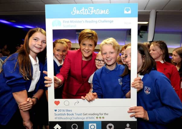 Nicola Sturgeon with pupils at the First Minister's Reading Challenge. Picture: Lisa Ferguson