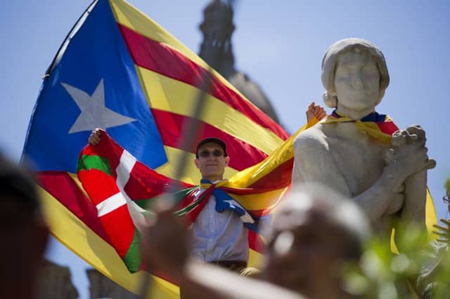 Barcelona residents attend a recent demonstration in support of a referendum in Catalonia. Picture: AP Photo/Emilio Morenatti