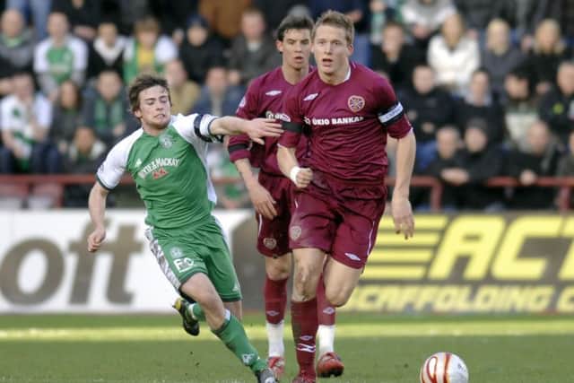 Christophe Berra is looking forward to renewing rivalries with Hibs. He is picture here jousting with Lewis Stevenson in 2009. and Hibs' Van Zanten. 3rd January 2009. Picture by JANE BARLOW