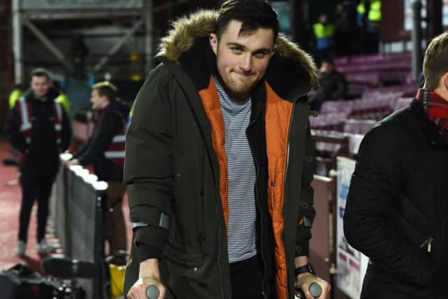Hearts' John Souttar had to use crutches after sustaining an Achilles injury. Picture: Craig Foy/SNS