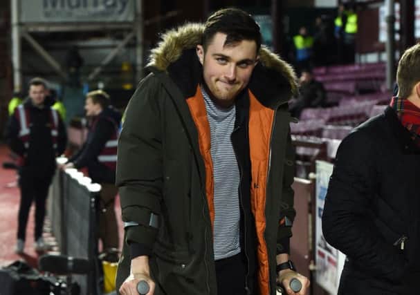 Hearts' John Souttar had to use crutches after sustaining an Achilles injury. Picture: Craig Foy/SNS