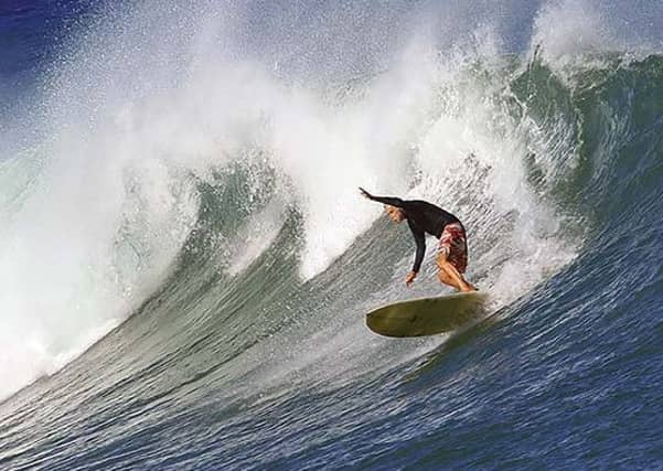 John Severson, the founder of Surfer magazine, pictured surfing at age 77