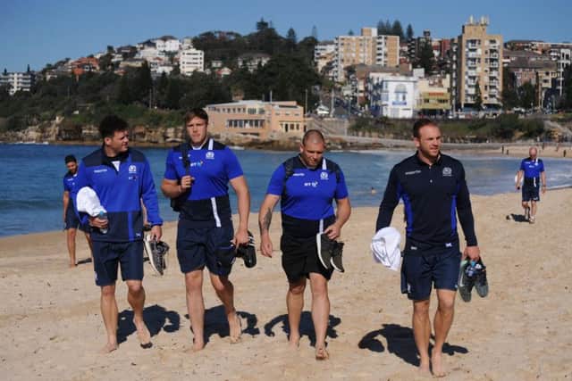 From left: Duncan Taylor, Jonny Gray, Gordon Reid and Greig Tonks walk along Coogee beach near Sydney ahead of tomorrow's Test against Australia. Picture: Fotosport/David Gibson