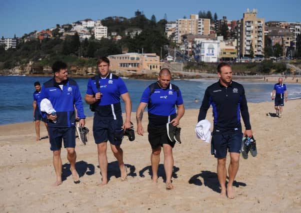 From left: Duncan Taylor, Jonny Gray, Gordon Reid and Greig Tonks walk along Coogee beach near Sydney ahead of tomorrow's Test against Australia. Picture: Fotosport/David Gibson