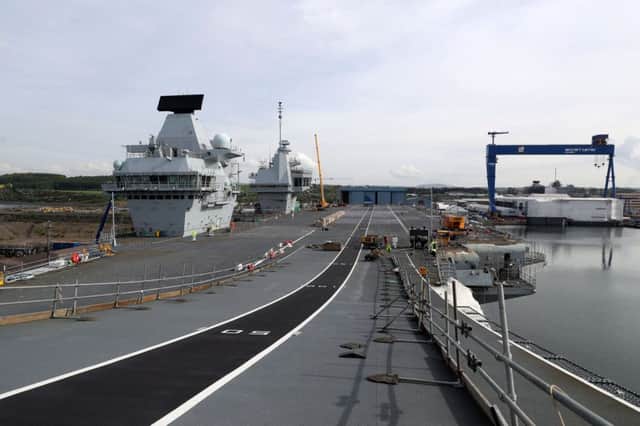 The flight deck of HMS Queen Elizabeth is 70 metres wide and 280 metres long  enough space for three football pitches. Picture: Ray Jones/Crown Copyright