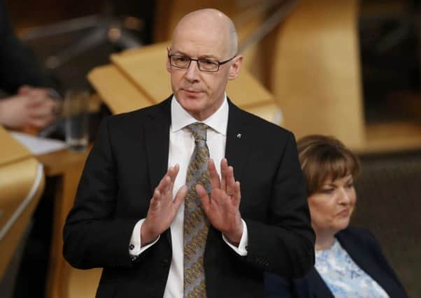 John Swinney prefers  to focus on 'governance' rather than 'budget cuts and staffing issues'. Picture: PA