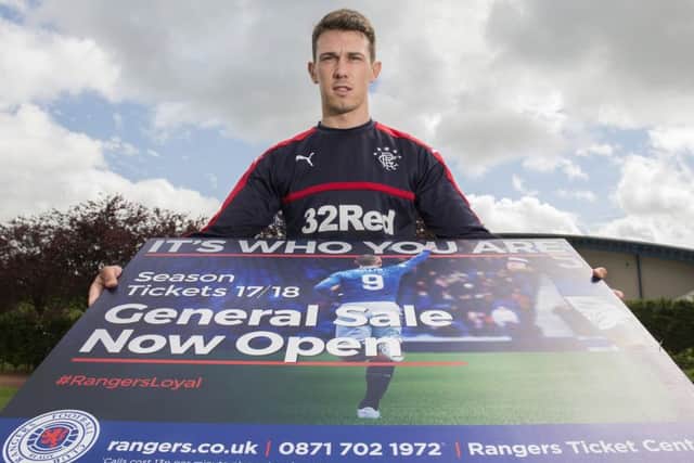 New Rangers signing Ryan Jack promotes the club's season tickets. Picture: Craig Foy/SNS