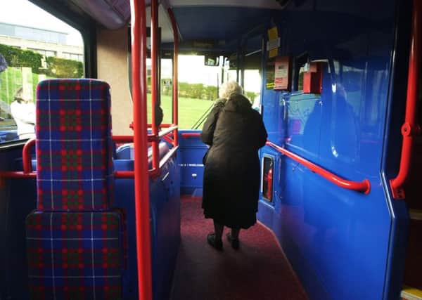 PICTURED IS ETHEL BROWN, PENSIONER, ON A BUS OUTSIDE DYNAMIC EARTH AS PART OF A PHOTOCALL WITH NICOL STEPHEN ,TRANSPORT MINISTER AFTER THE ANNOUNCEMENT OF CONCESSIONARY TRAVEL FOR THE ELDERLY AND DISABLED.