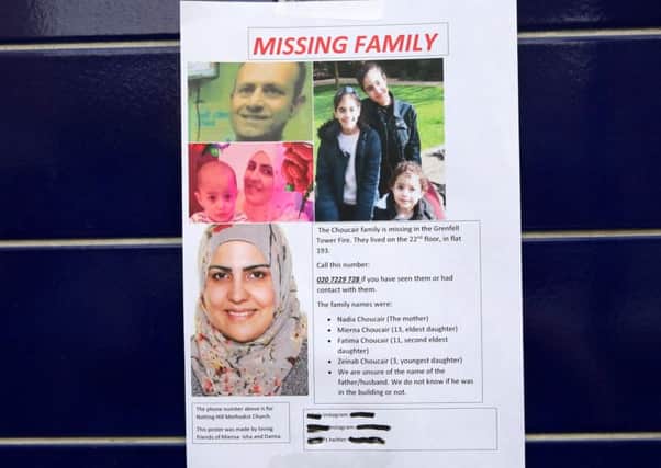 A missing poster for Nadia, Mierna, Fatima and Zeinab Choucair put up after the fire in Grenfell Tower, West London. June 16 2017. Picture: SWNS