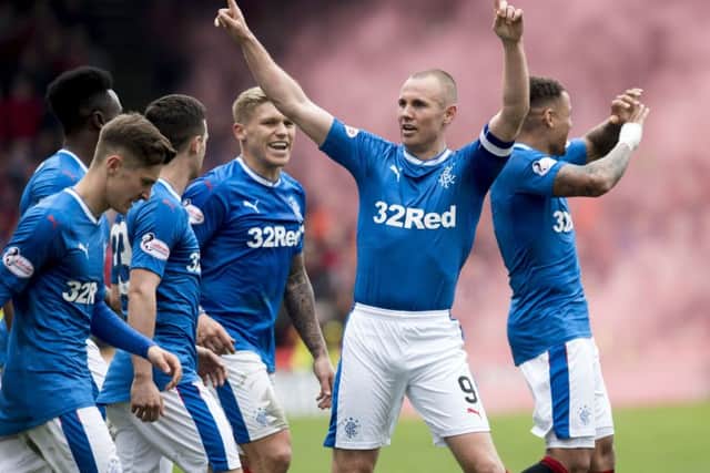 Rangers No 9 Kenny Miller says pre-season training has been different this summer because the players were barely away before they were back. Photograph: Ross Parker/SNS