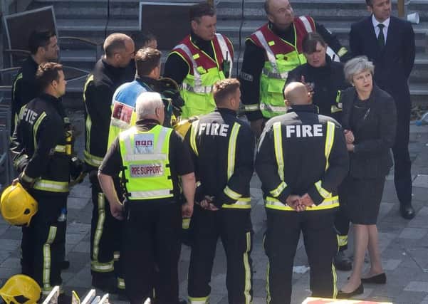 The Prime Ministers visit to Grenfell Tower on Thursday was tightly controlled to minimise the risk that she might meet members of the public. Photograph: Dan Kitwood/Getty Images