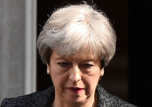 Questions over the Prime Ministers judgement have been raised following her reaction to the Grenfell Tower disaster. Picture: Chris J Ratcliffe/Getty Images