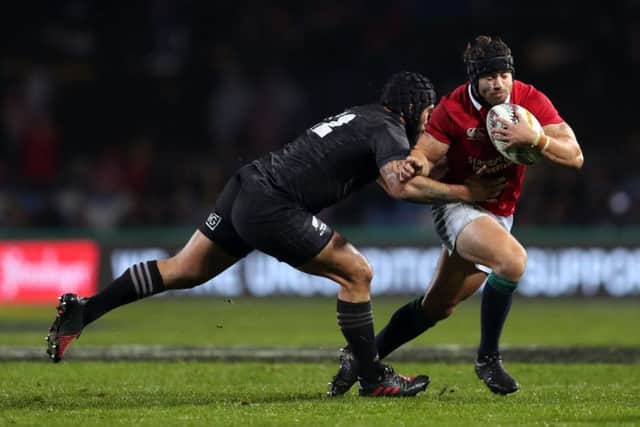 British and Irish Lions' Leigh Halfpenny is tackled during the Tour match at the Rotorua International Stadium. Picture: David Davies/PA Wire