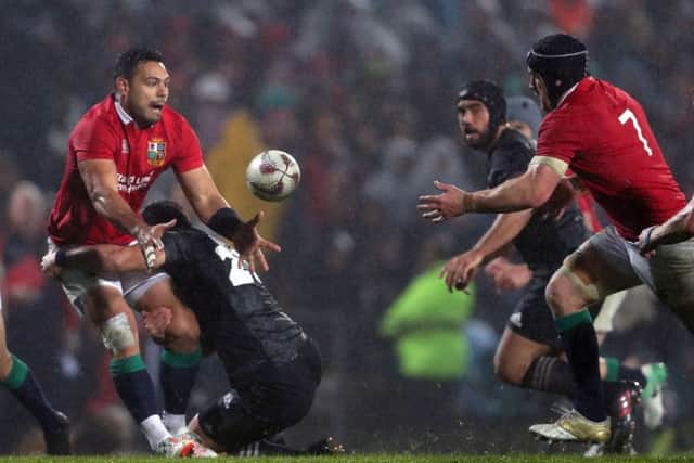 British and Irish Lions' Ben Te'o offloads the ball to Sean O'Brien during the Tour match at the Rotorua International Stadium. Picture: David Davies/PA Wire
