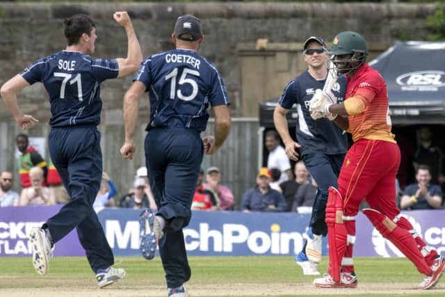 Chris Sole celebrates one of his three early wickets yesterday but Zimbabwe still met their target. Photograph: Donald MacLeod