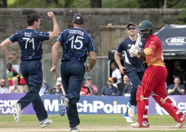 Chris Sole celebrates one of his three early wickets yesterday but Zimbabwe still met their target. Photograph: Donald MacLeod