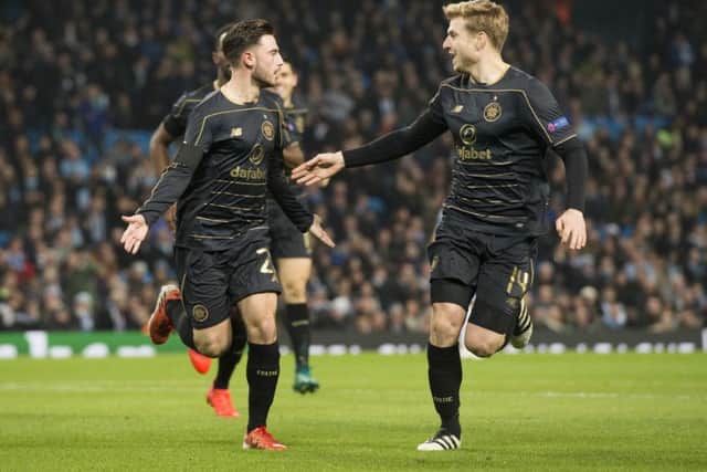 Celtic fans will hope for more moments like this, as Patrick Roberts, left, and Stuart Armstrong celebrate the wingers goal  away to Manchester City last season. Picture: SNS